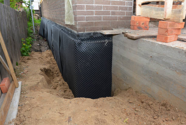 Happy homeowners after waterproofing job in Colfax